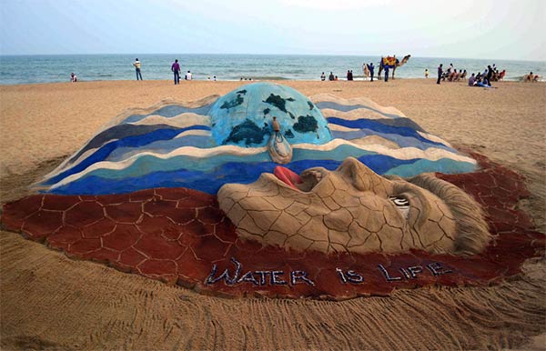 Water Day Sand Sculpture by Sudarshan Pattnaik