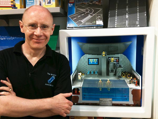 Gary Davis standing with Lego Aquatic Centre