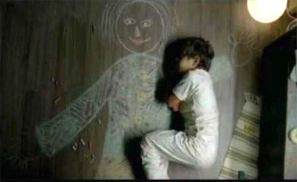 Orphan Boy Draws Mother Picture on Floor