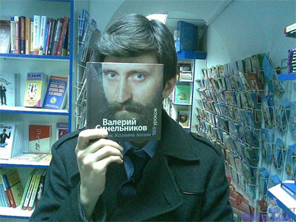 People Creatively Blend Themselves in with Book Covers