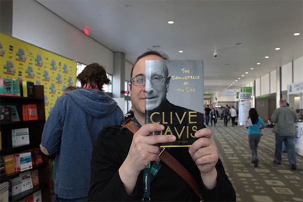 People Creatively Blend Themselves in with Book Covers