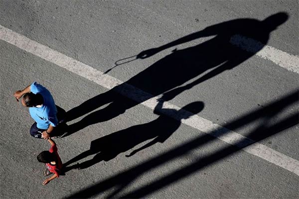 Father & Son's Shadow on The Road