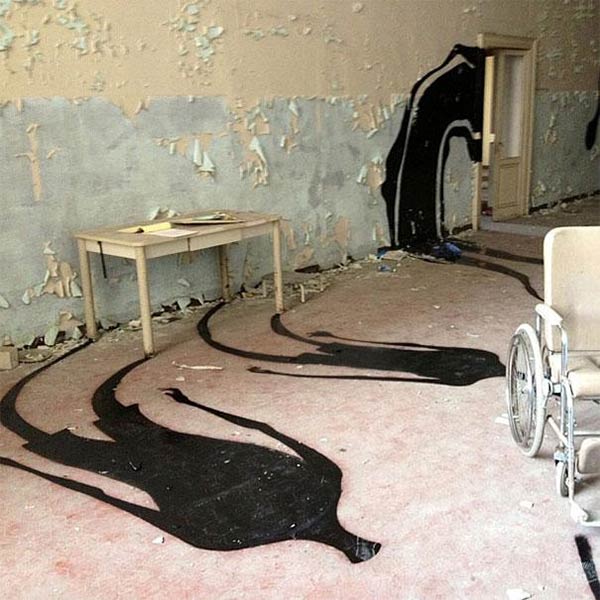 Street Artist Paints Ghostly Shadows in Mental Hospital