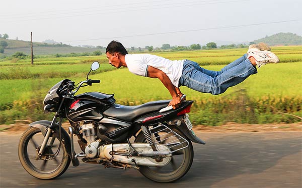 Yoga Poses Performed on Speeding Motorbike