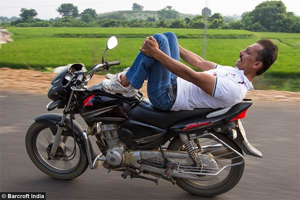 Yoga Poses Performed on Speeding Motorbike