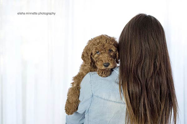 Couple Takes Newborn Photos With Their Dog