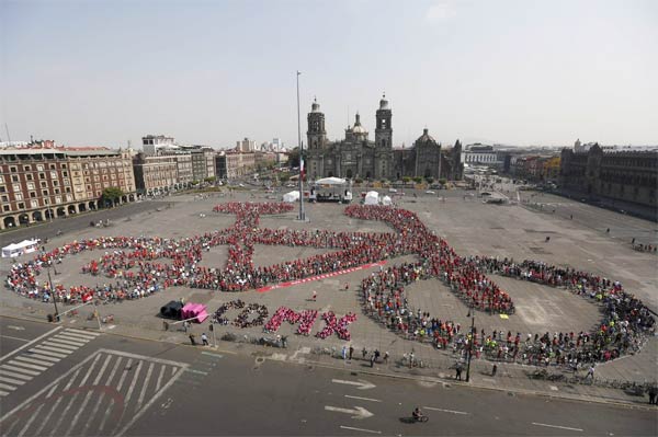 Cyclists Gather To Form A Shape of A Bicycle