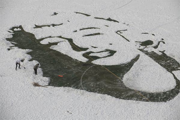 Marilyn Monroe Portrait Created with Snow On Soccer Pitch