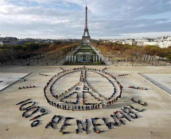 Environmentalists Forming Peach & Hope Symbol