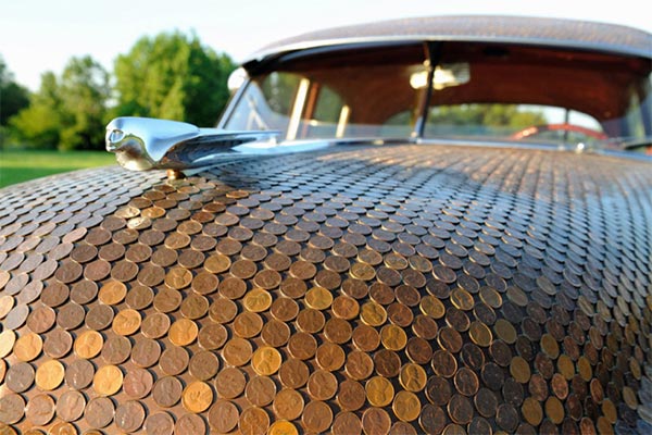 Couple covers classic car with 38,000 pennies