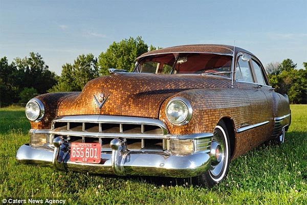 Couple covers classic car with 38,000 pennies