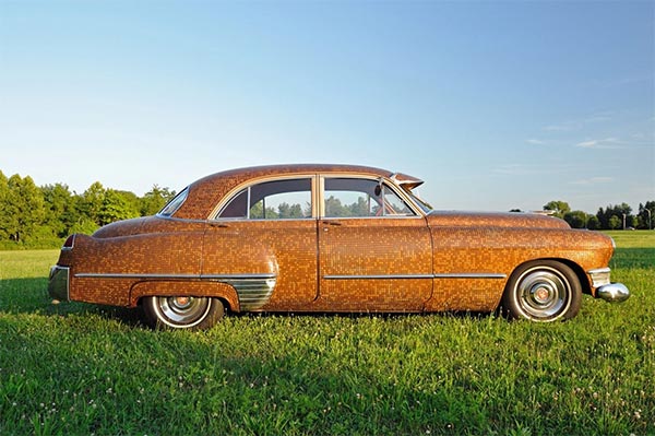 Couple covers classic car with 38,000 pennies