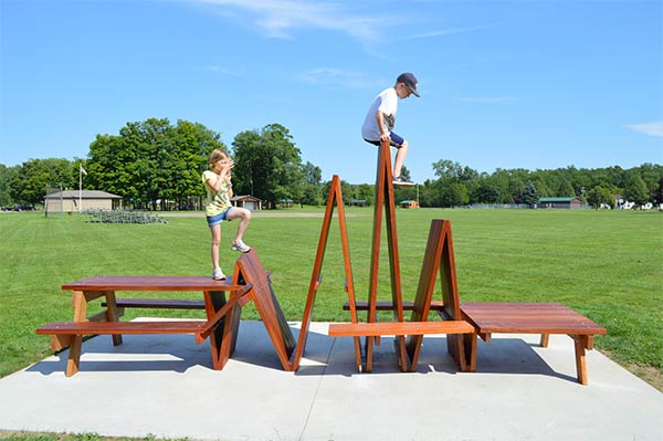 Wooden Picnic Tables Turned Into Creative Functional Sculptures