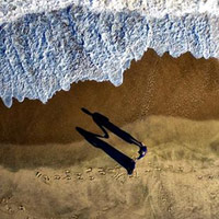 Perfectly-Timed Couple's Aerial Photo