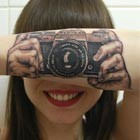 Optical Illusion with Camera-Inspired Tattoo