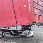 Crash Victims Survive After Car is Crushed Flat By Lorry’s Shipping Container