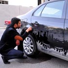 Dirty Car Art by Parking Attendant from Azerbaijan