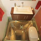 Glass-Floored Bathroom