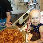 2-Year-Old Cancer Patient Gets Pizza Party When She Taped The Request On Her Window