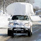 Lazy Driver Having Large Chunk of Snow On Its Top