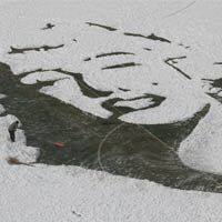 Marilyn Monroe Portrait Created with Snow On Soccer Pitch