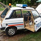 Police Car Transformed Into A Chicken Coop