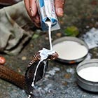 Snake Bathing with Milk in Nag Panchami Festival, India