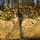 Husband Builts Stone Tree In Memory of His Wife