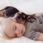 Cute Photos of a Toddler Napping with His Puppy