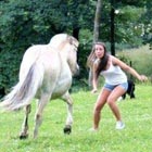 10 Funny Examples of Women Messing with Animals